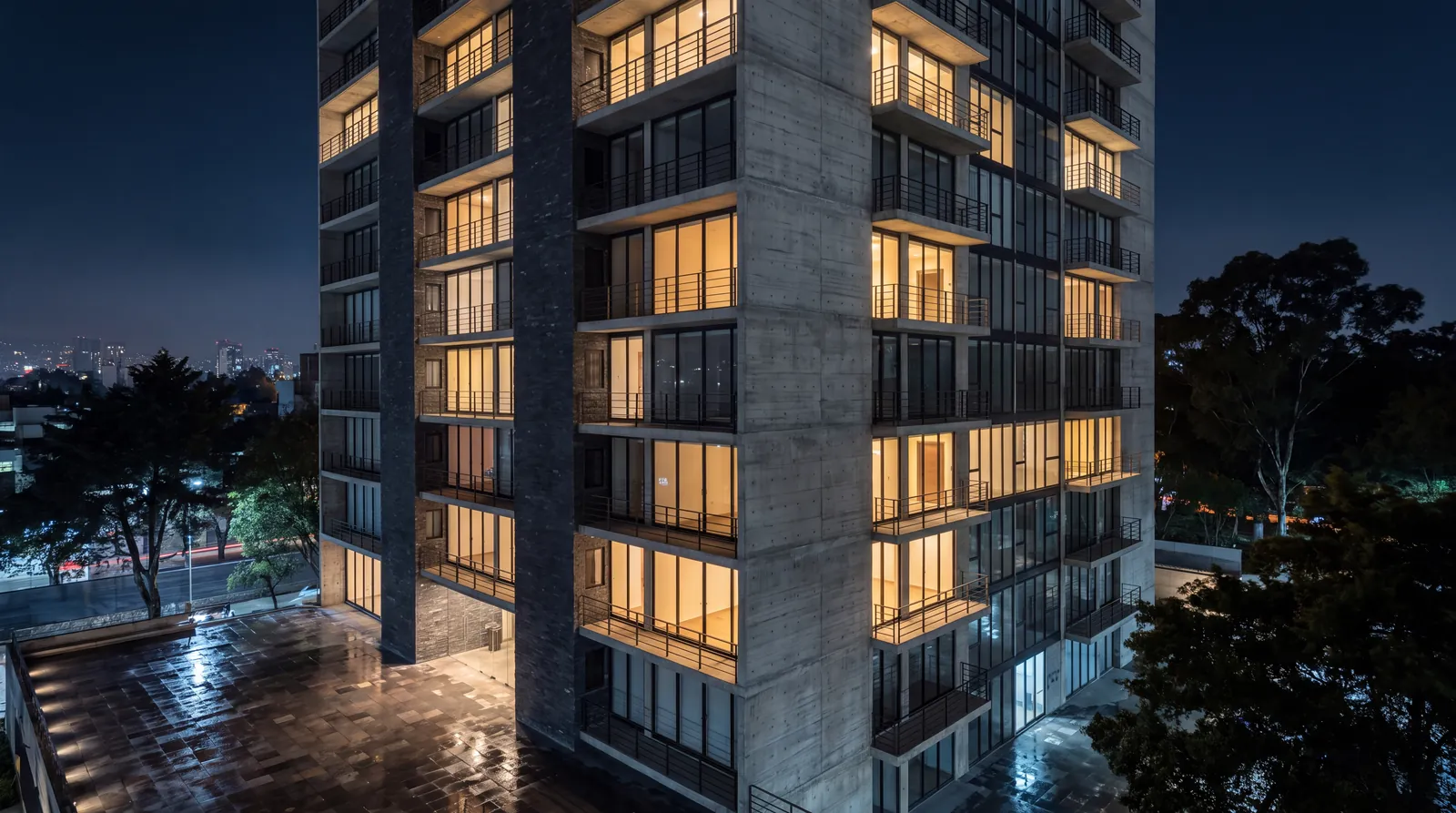 Night render of the tower with some of the apartments lit